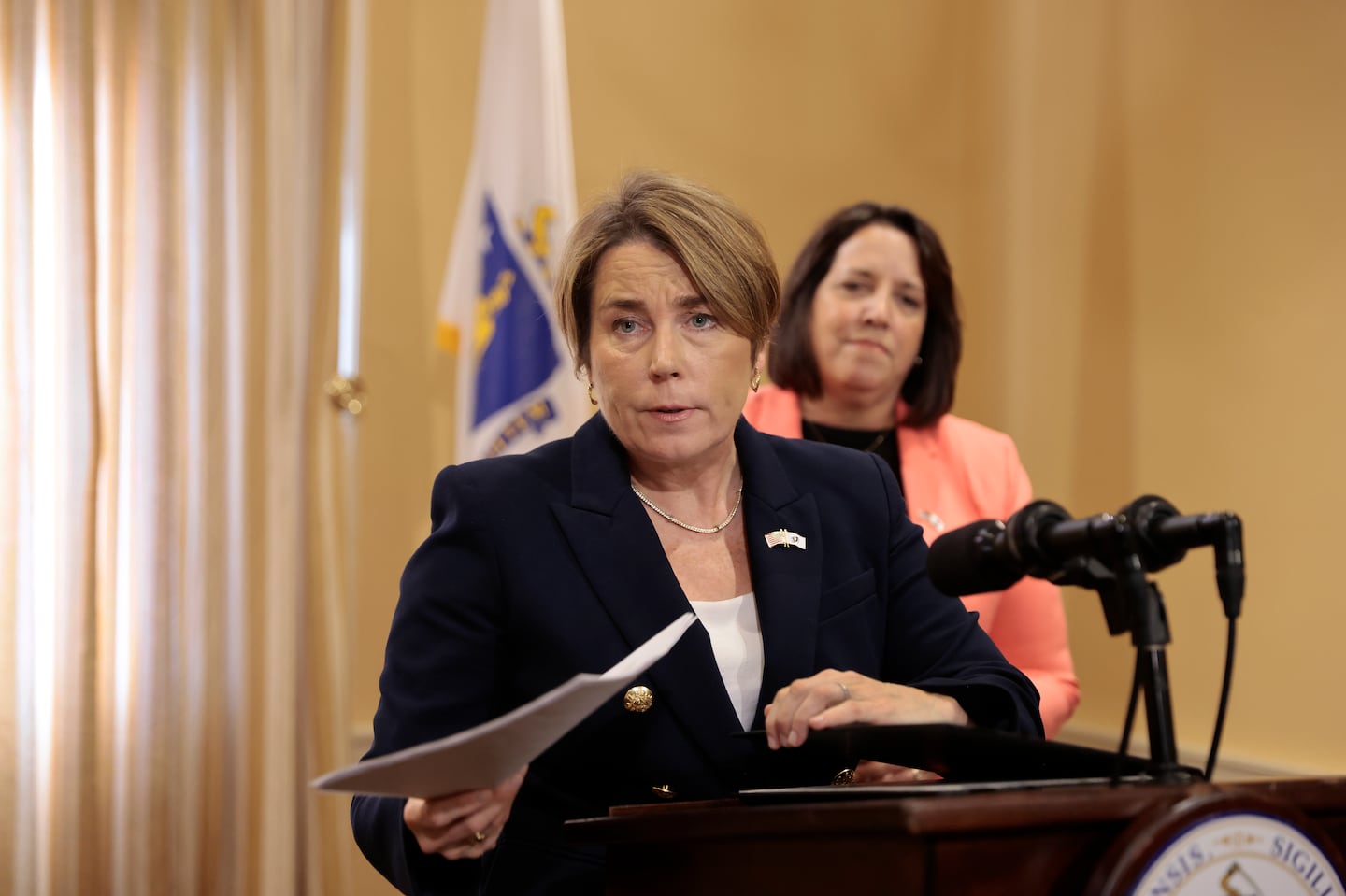 Governor Maura Healey speaks to reporters earlier this month at the State House.