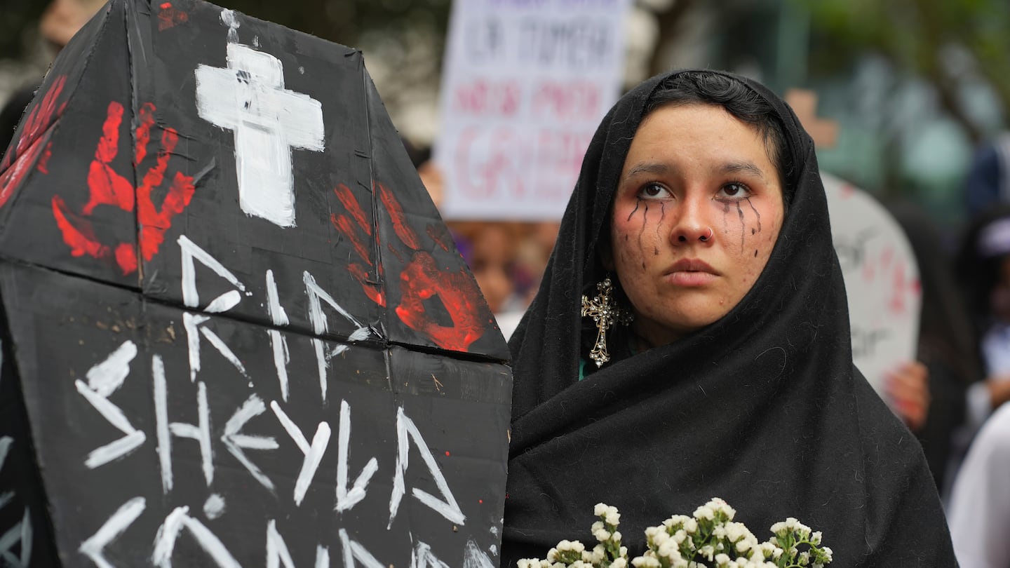 Ariana Campos takes part in a march marking the upcoming International Day for the Elimination of Violence Against Women, in Lima, Peru, on Nov. 23.