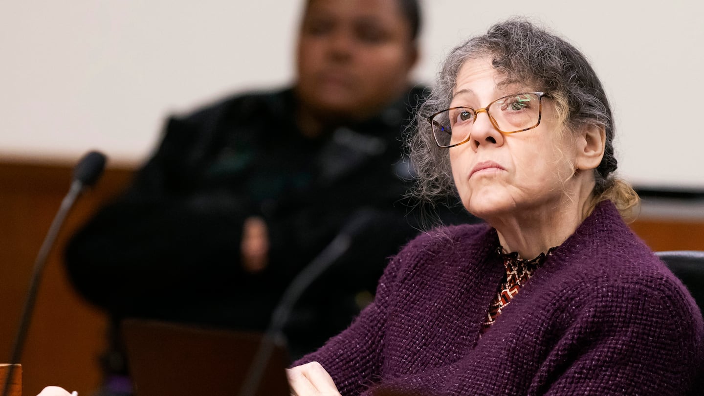 Defendant Susan Lorincz takes notes during her trial, Aug. 13, in Ocala, Fla.