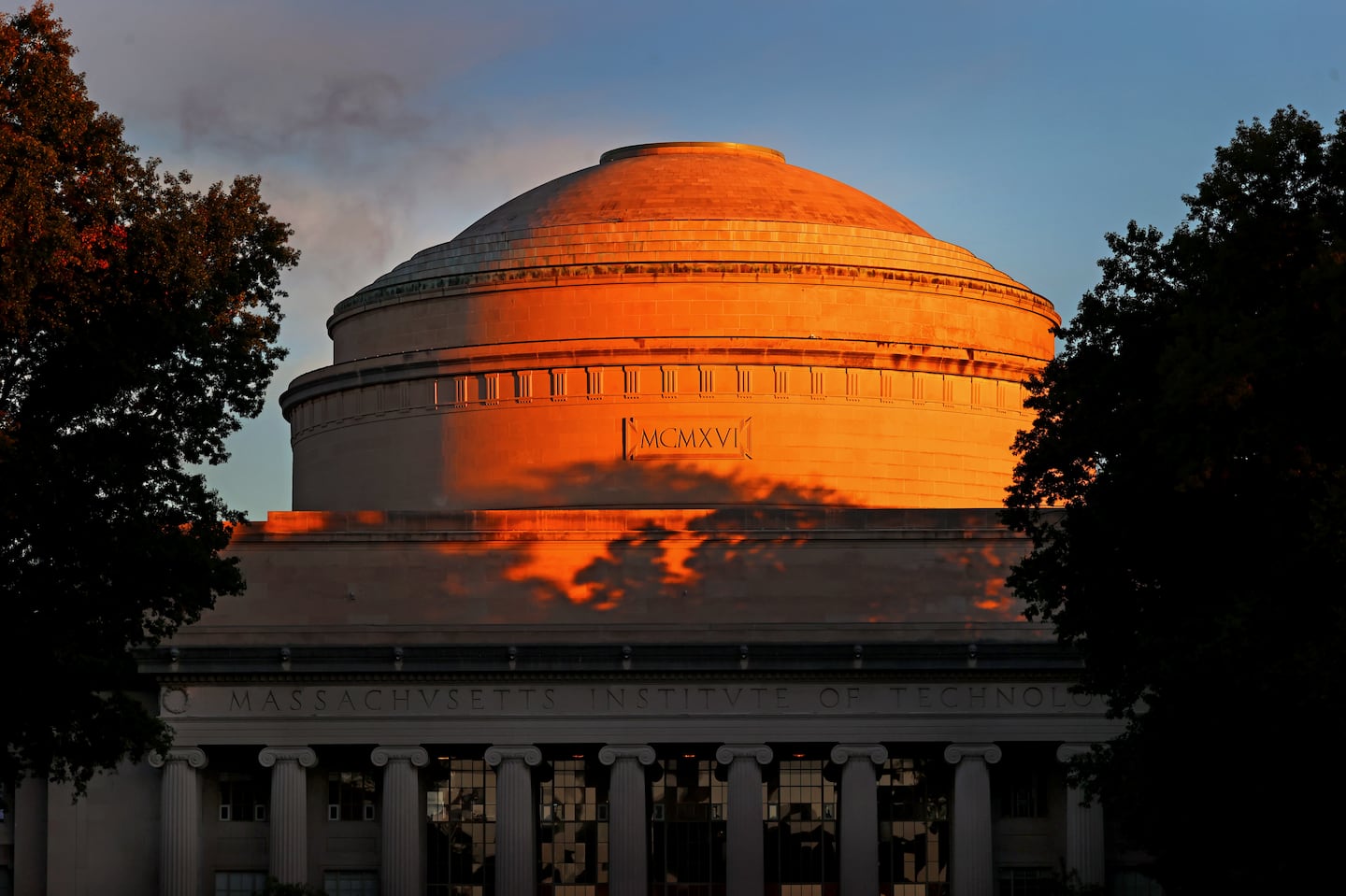 The Massachusetts Institute of Technology dome highlighted by a morning sunrise.