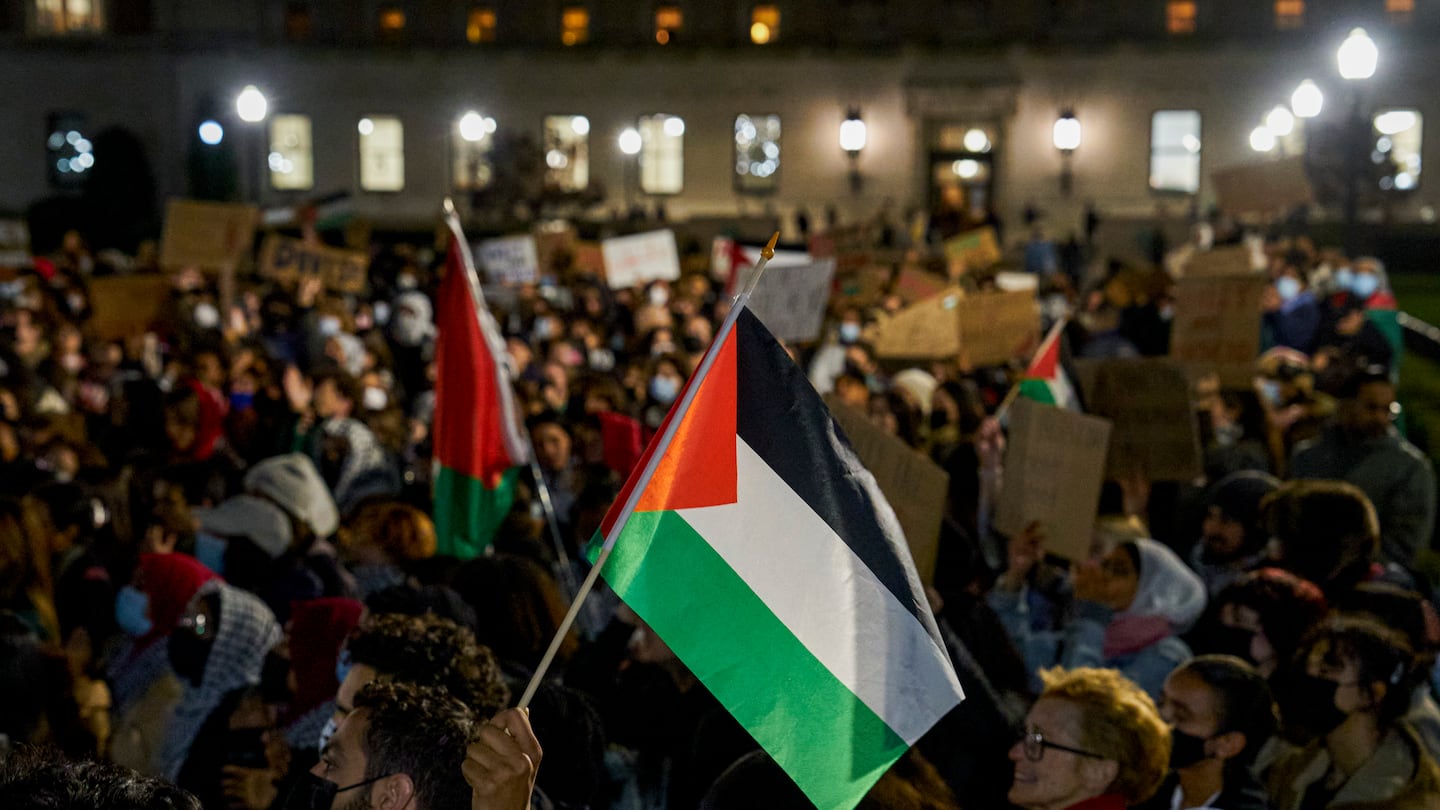 Students waved Palestinian flags at a demonstration opposing Columbia University’s suspension of the groups Students for Justice in Palestine and Jewish Voices for Peace, during a protest at the school’s campus in New York, Nov. 14, 2023.