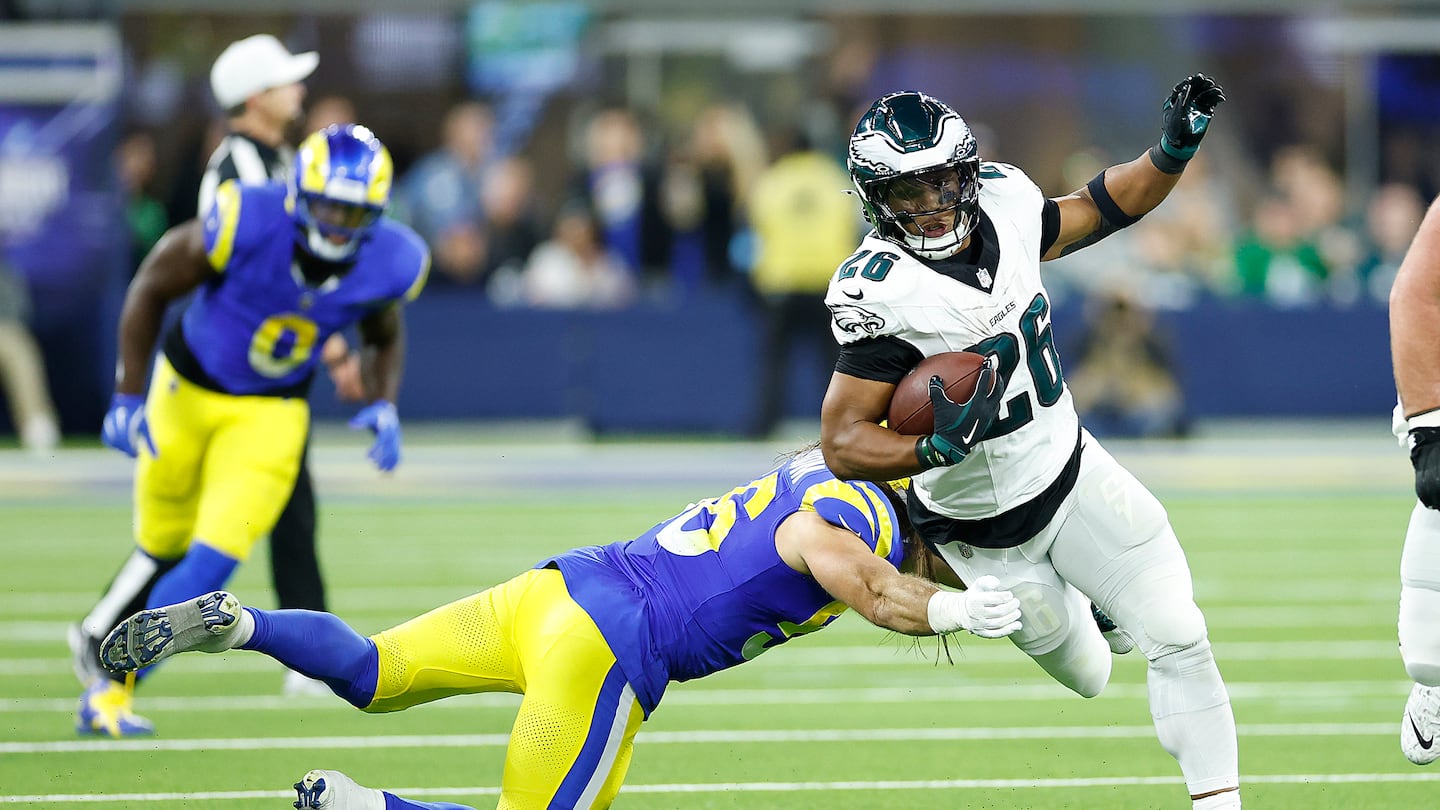 Saquon Barkley (right) rushed for 255 yards and two touchdowns against the Rams Sunday night.