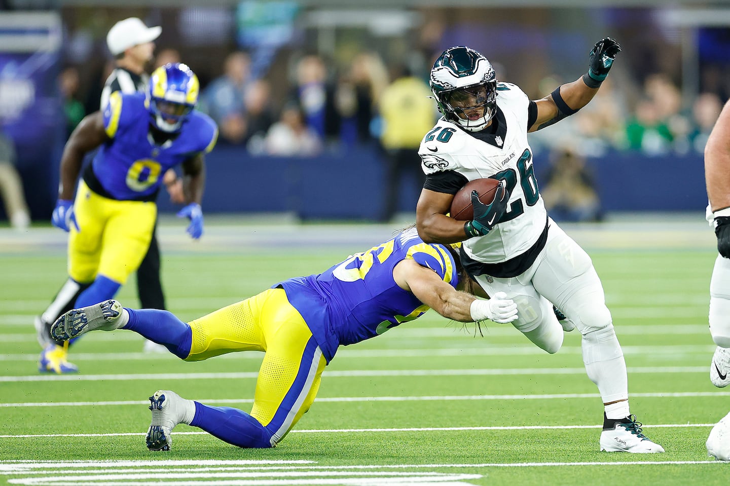 Saquon Barkley (right) rushed for 255 yards and two touchdowns against the Rams Sunday night.