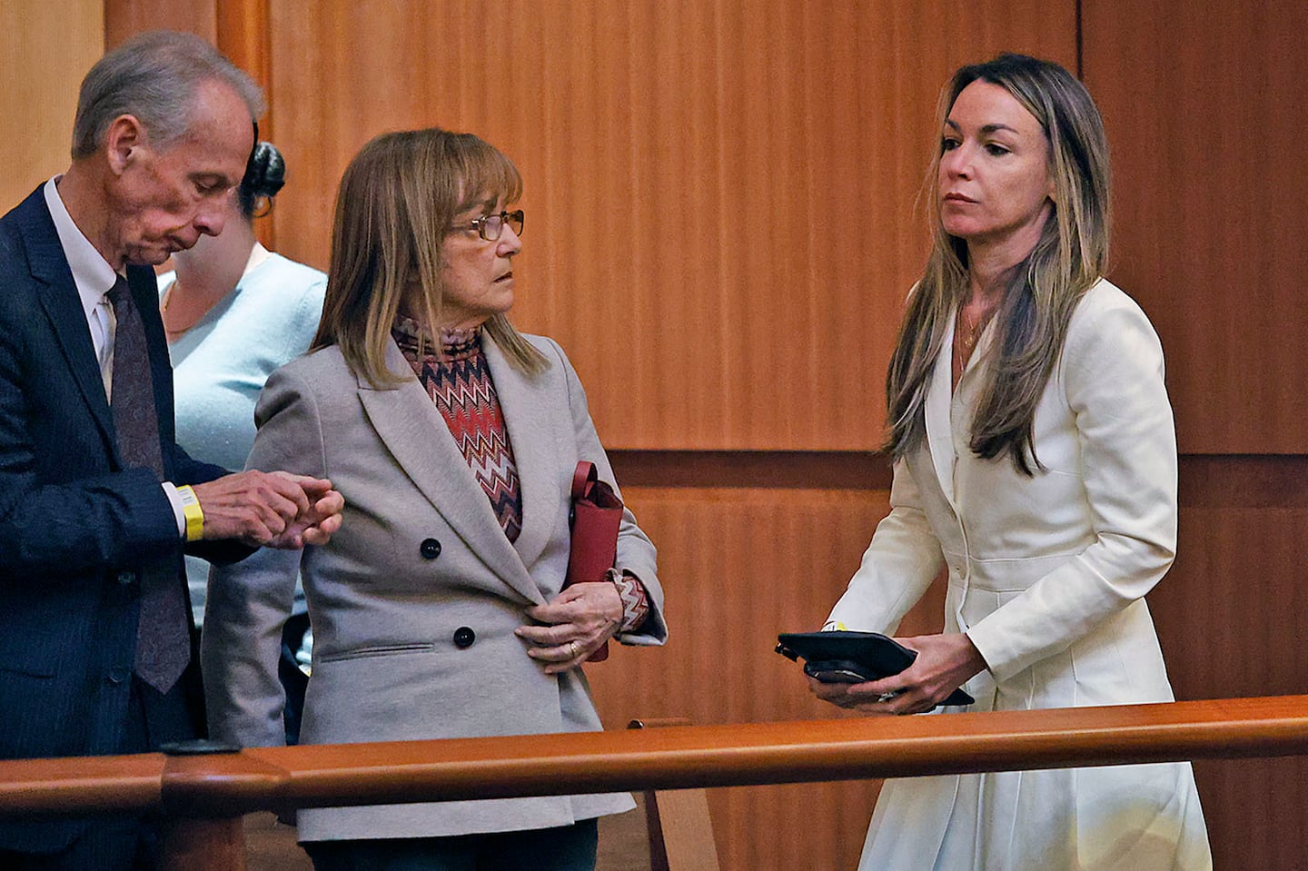 Karen Read, right, leaves the courtroom with her parents, William and Janet, on Nov. 6.