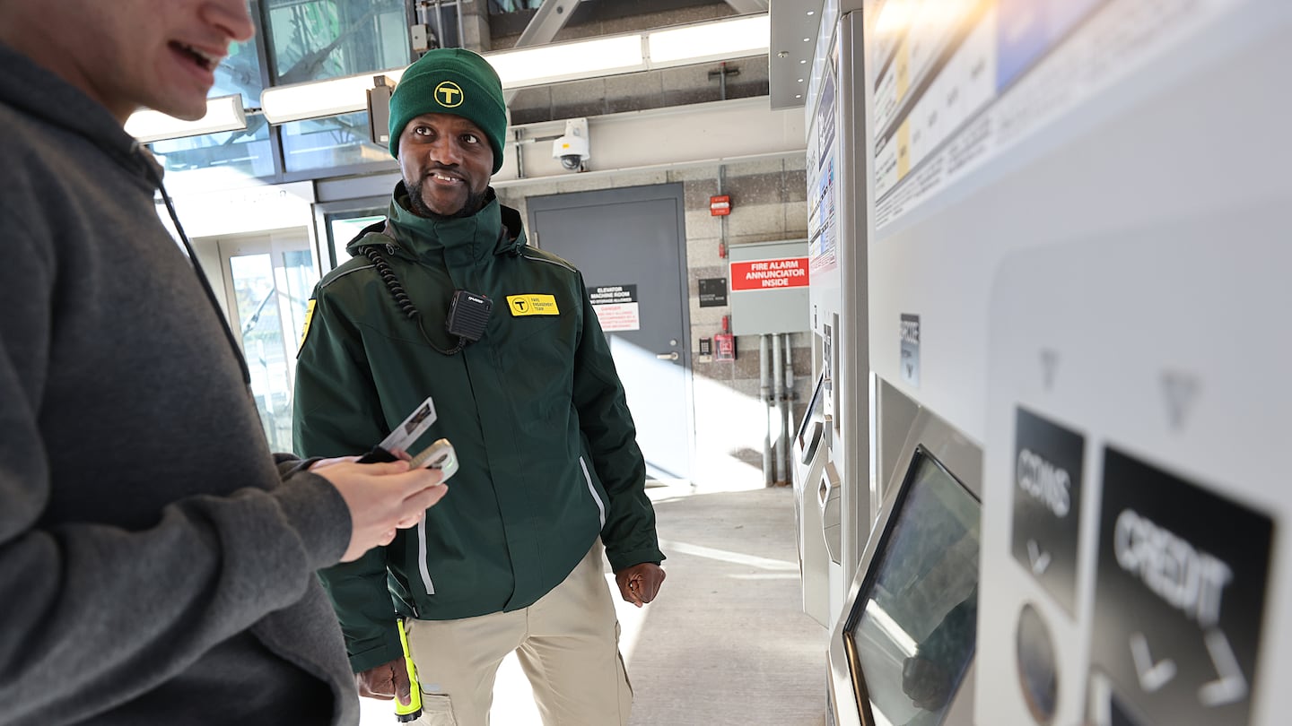 At Lechmere Station, fare engagement representative Frantzlay Mentor assisted a rider.