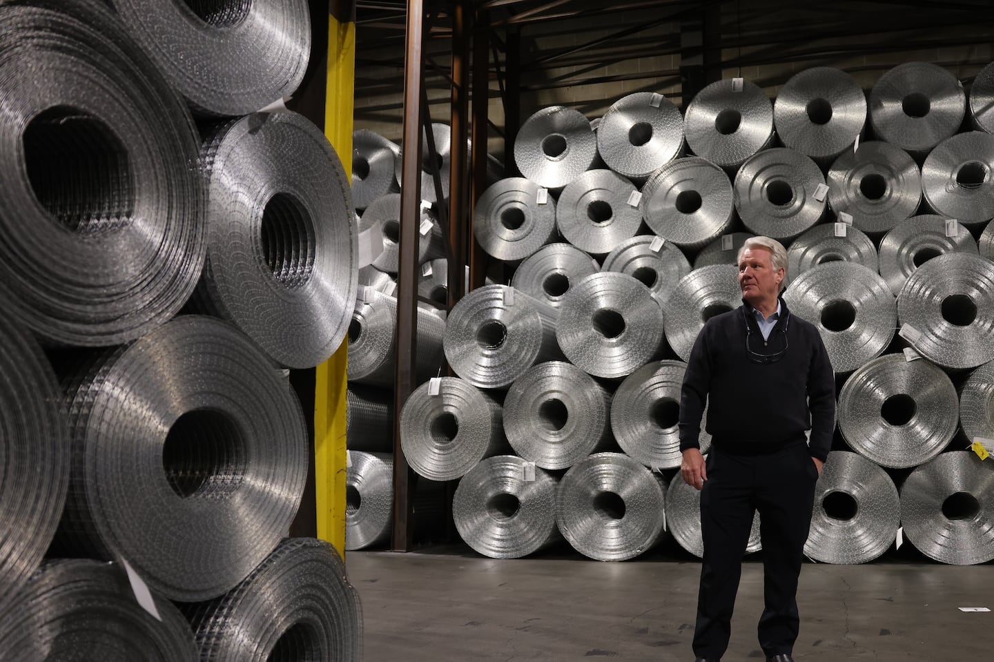 Riverdale Mills CEO James Knott stood in front of the welded steel mesh made by his company and used by lobstermen and others in the fishing business.