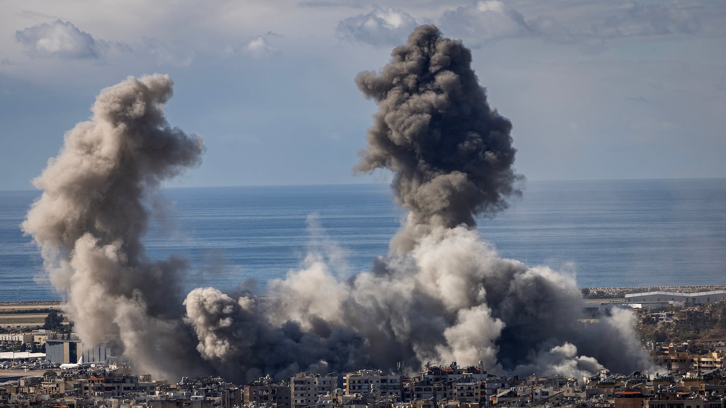 Smoke billows from multiple Israeli airstrikes targeting Dahieh, south of Beirut, Lebanon, on Nov. 26.