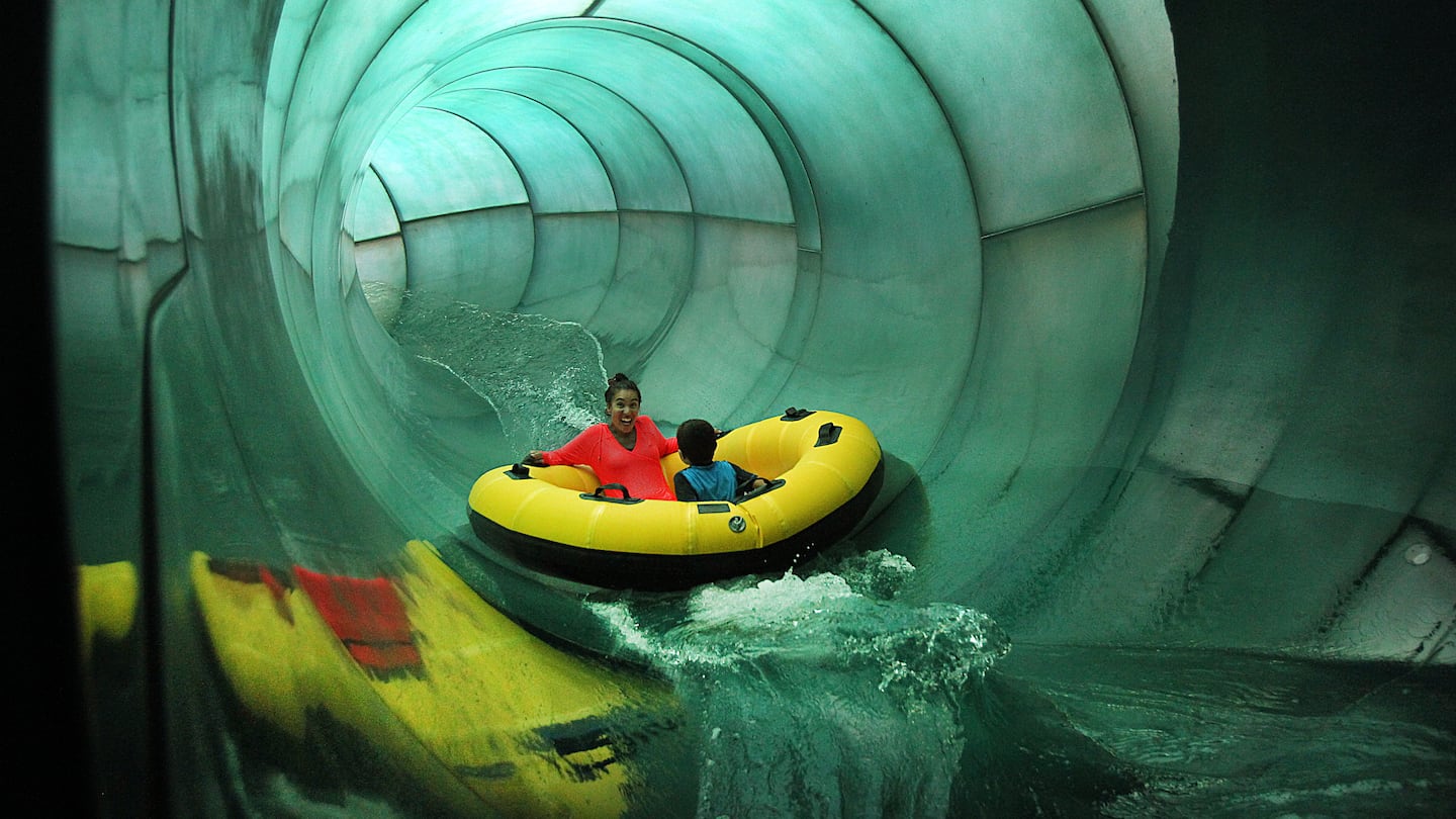 Tarsha Ancrum and her son Denzel, 6, of Lynn, headed down one of the giant water slides at Great Wolf Lodge in Fitchburg in 2014.