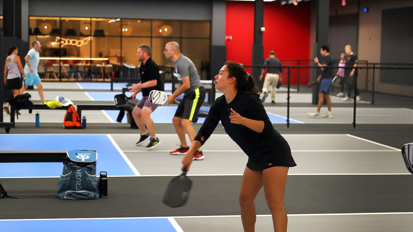 People played pickleball Tuesday at the newly opened Bosse, a pickleball supercenter housed in the space of the former Nieman Marcus store at the Natick Mall.