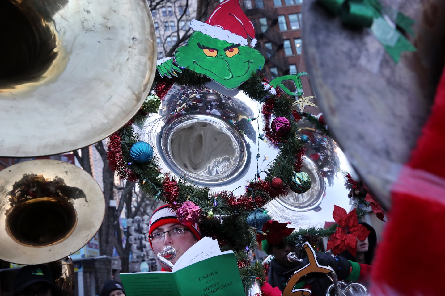 Gabby Grondalski played along during the 34th annual Boston Tuba Christmas concert at Faneuil Hall Marketplace in 2019. This year's concert will take place on the Steps at Downtown Crossing Saturday at noon.