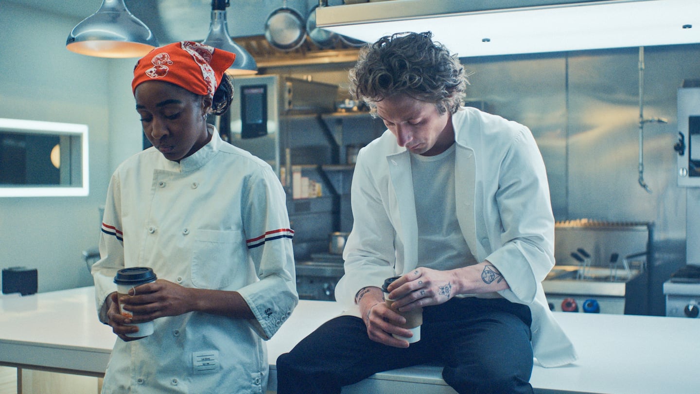 In a scene from Season 3, Episode 1, Ayo Edebiri as Sydney Adamu and Jeremy Allen White as Carmen “Carmy” Berzatto.