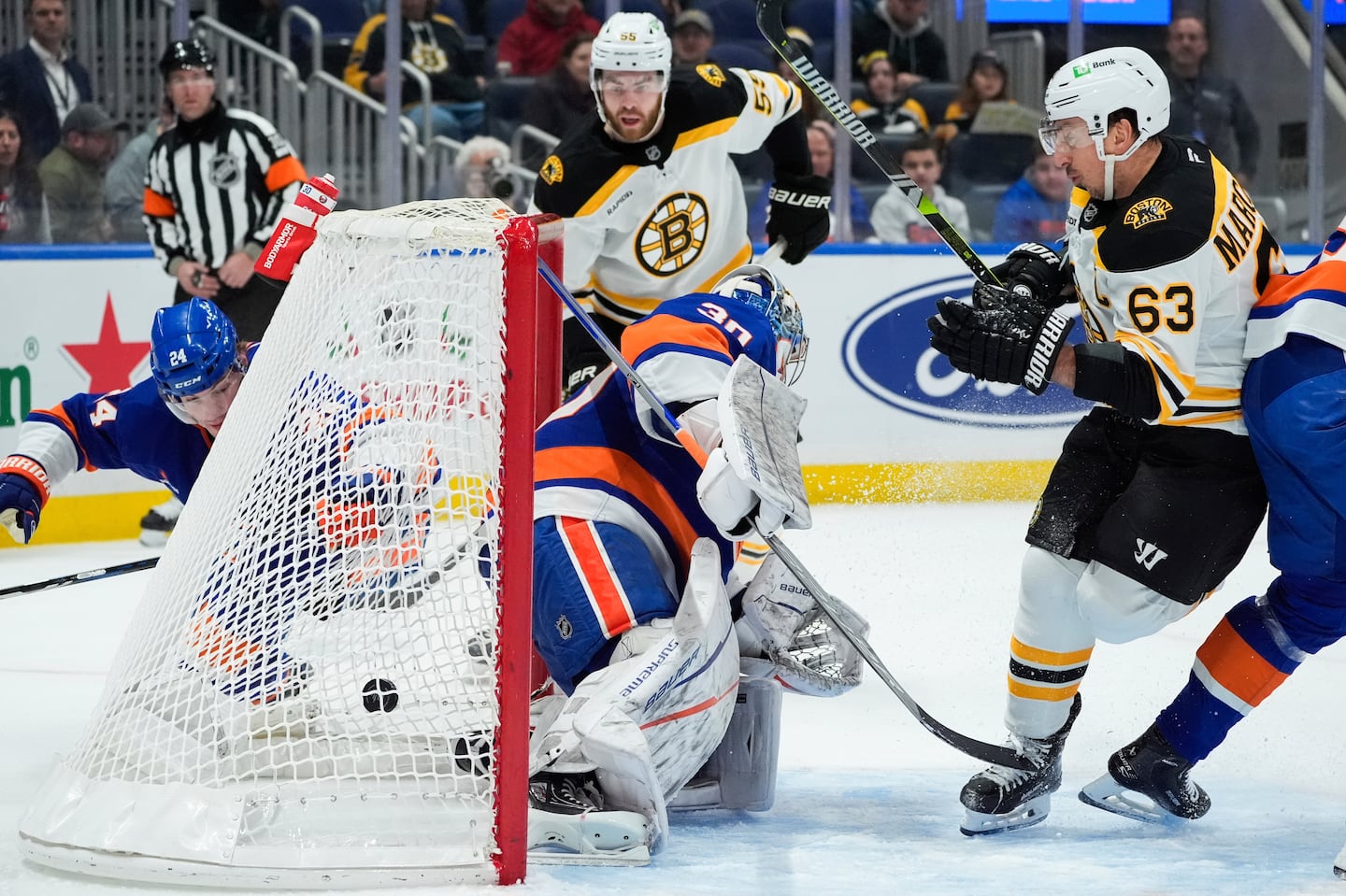 Bruins left wing Brad Marchand (right) scored his second goal of the first period against the Islanders.