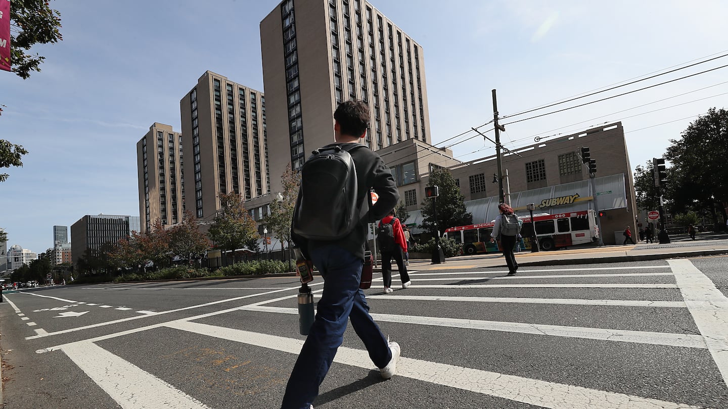 Pedestrians crossed Commonwealth Avenue at Boston University in September 2023.