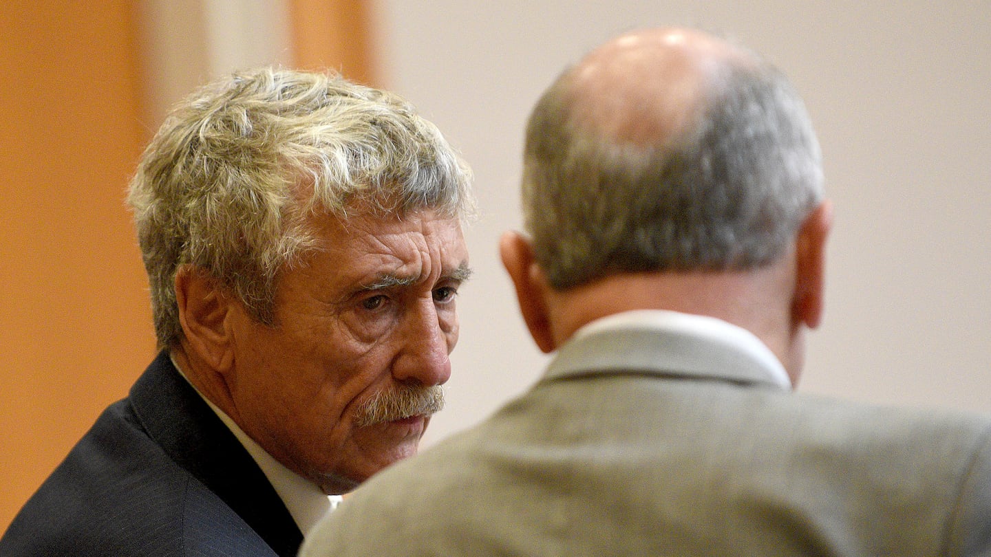 Defendant Bradley Asbury, left, accused of holding down a teenage boy so colleagues could rape him at a New Hampshire youth center in the 1990s, conferred with his attorney David Rothstein during opening statements for his trial at Hillsborough County Superior Court in Manchester, N.H., last week.