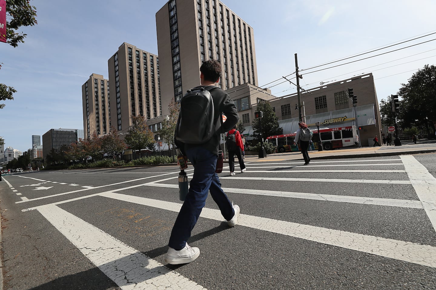 Pedestrians crossed Commonwealth Avenue at Boston University in September 2023.