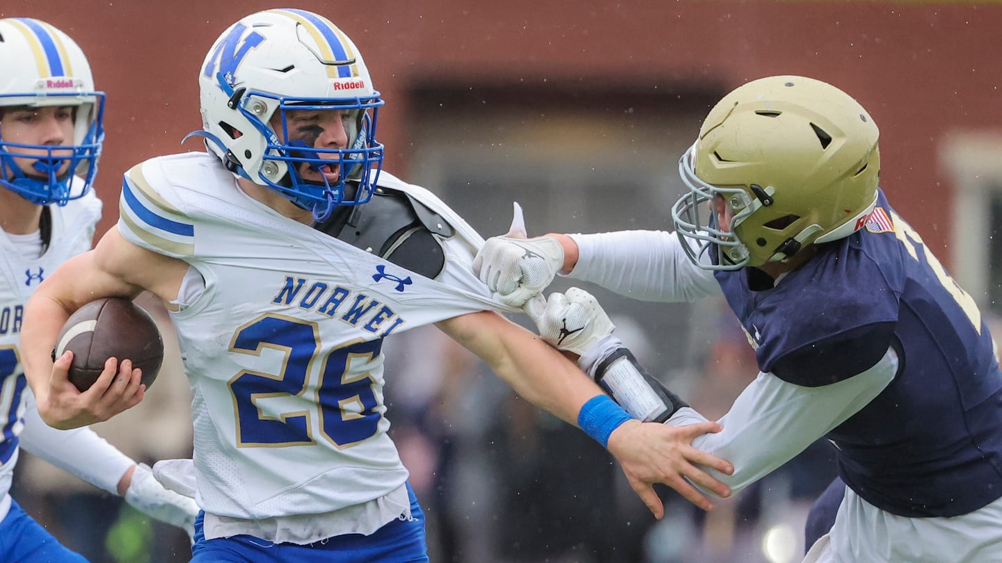 William Bostrom, who ran for a touchdown and winning 2-point conversion in double overtime, was tackled by Hanover's Sebastian Brown, who caught a touchdown pass in the first OT.