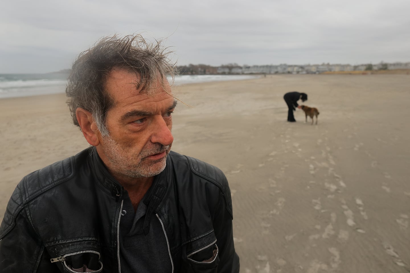 Patrick Fealey joined his girlfriend, Lane McDonald, for a walk on Narragansett Town Beach with his dog, Lily. Fealey, a former Boston Globe correspondent and Narragansett Times art critic, just wrote an in-depth account in Esquire magazine about being homeless in Rhode Island.