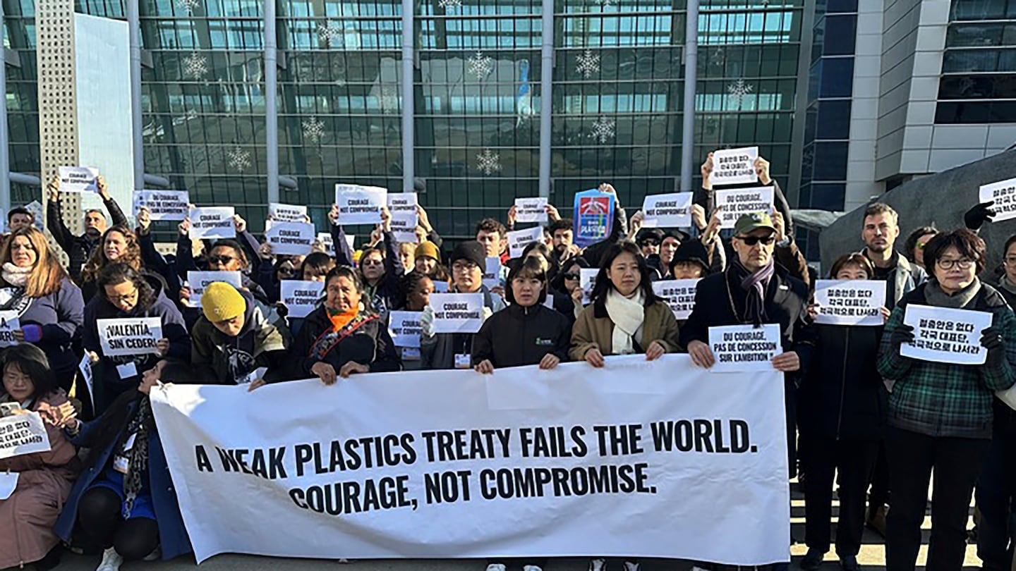 Environment activists hold a press conference calling for a strong global plastics treaty outside of the venue for the fifth session of the Intergovernmental Negotiating Committee on Plastic Pollution in Busan, South Korea, on Nov. 29.