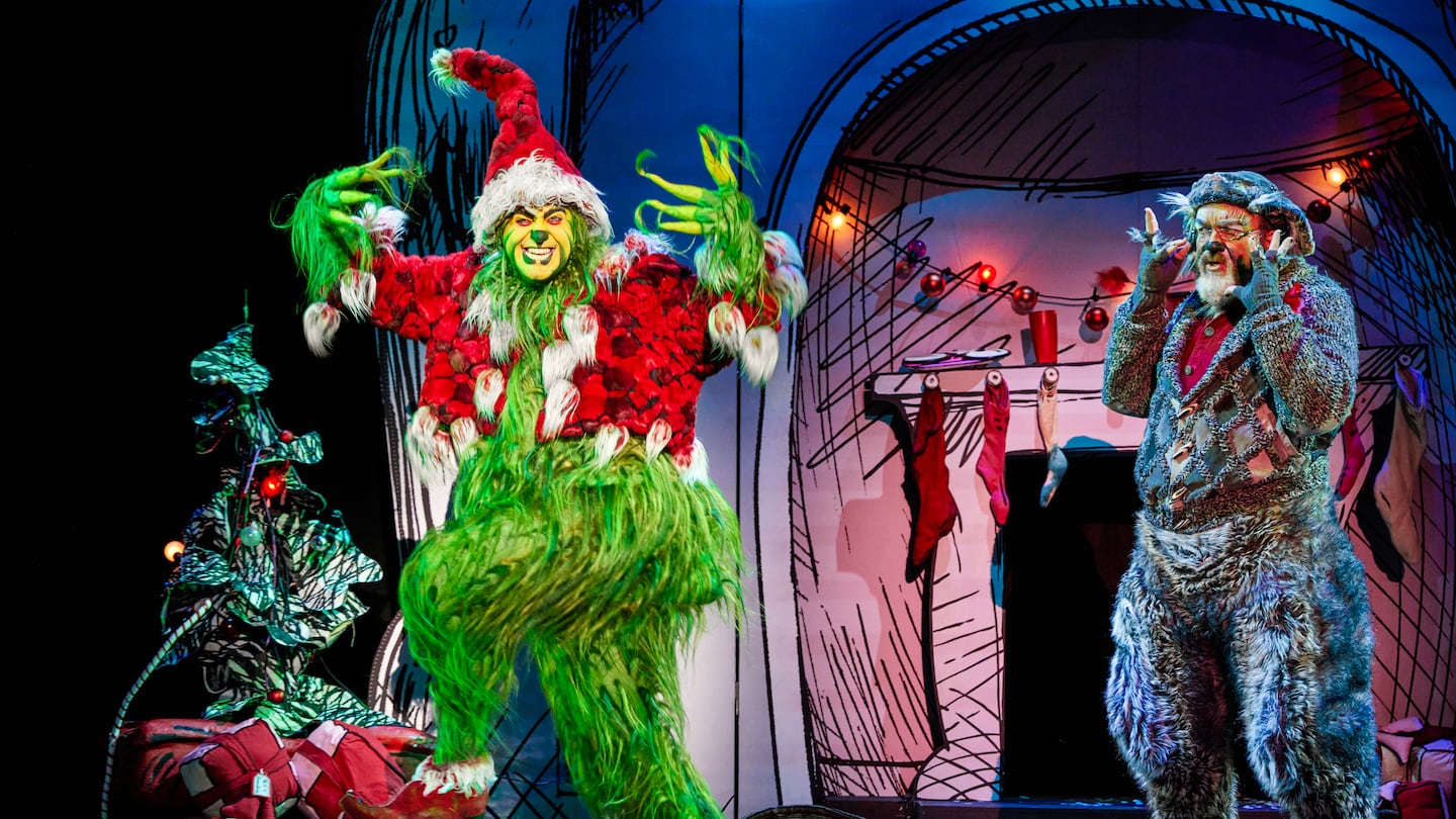 James Schultz as the Grinch and W. Scott Stewart as Old Max in "How the Grinch Stole Christmas! The Musical."