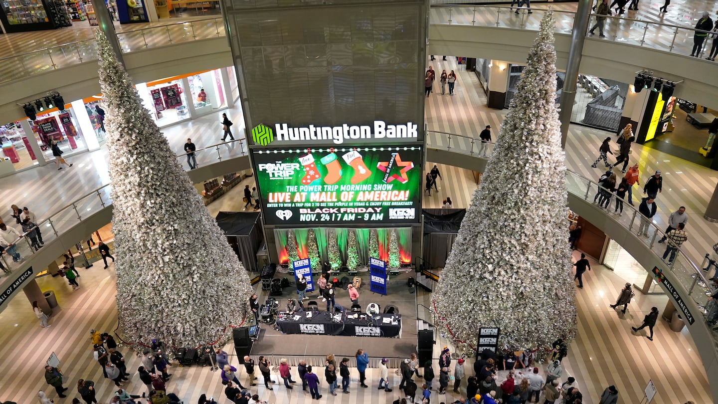 People shop at Mall of America, Friday, Nov. 24, 2023, in Bloomington, Minn.