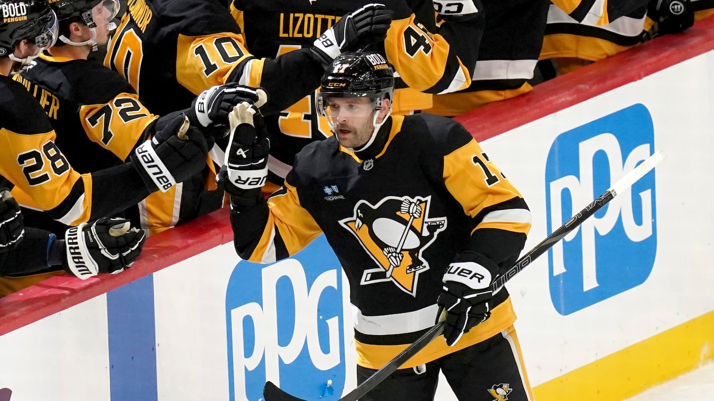 Pittsburgh's Bryan Rust had two goals in a win over the Canucks Wednesday.