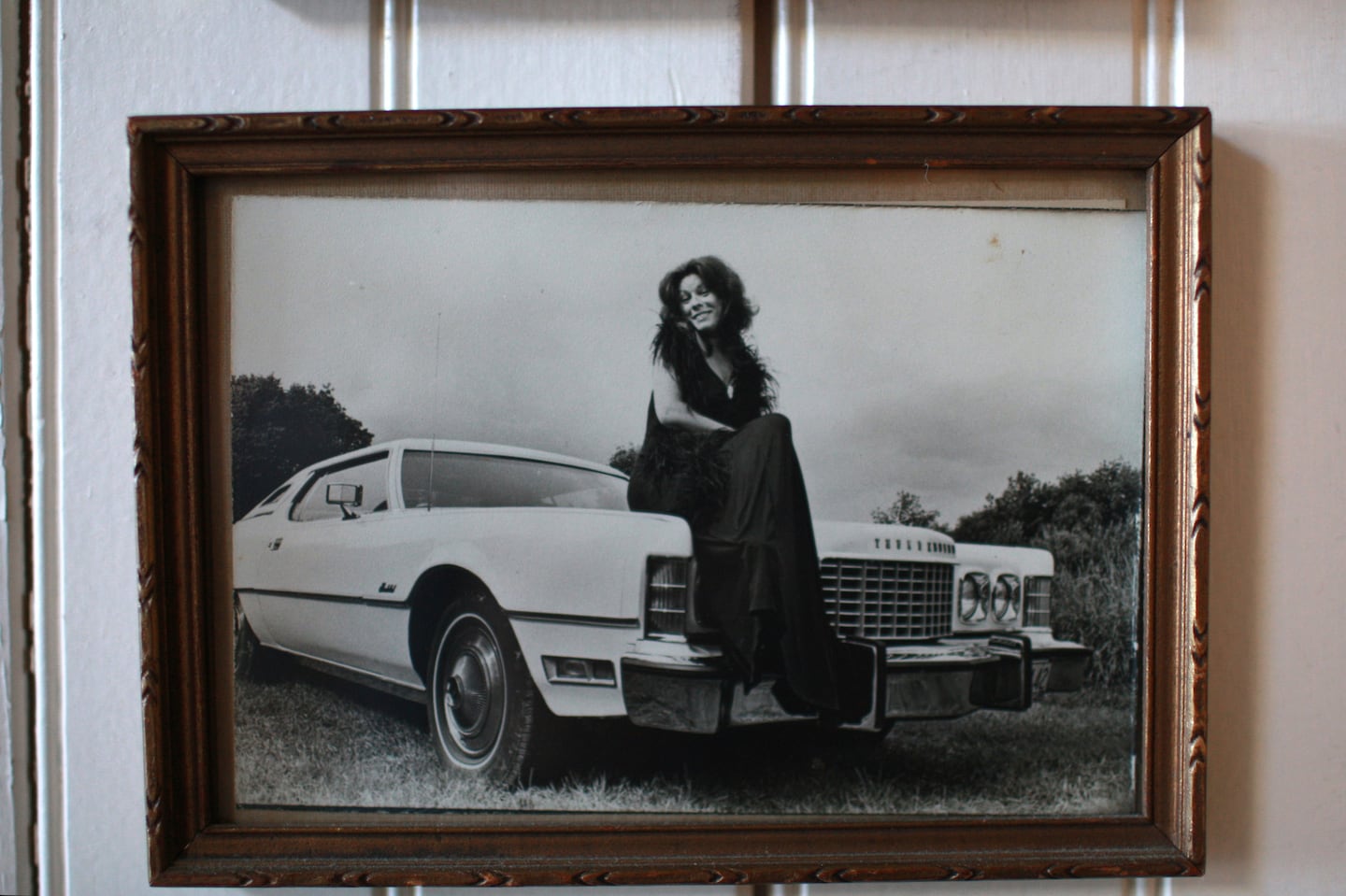 Alice Brock smiles in a framed photo from the 1970s, which hung on a wall in her Provincetown home in 2008.