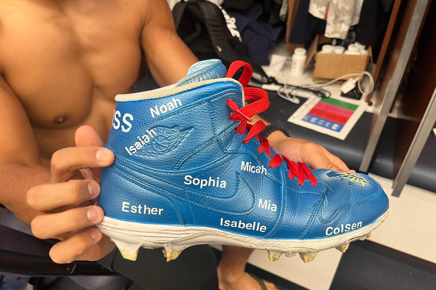 Patriots linebacker Christian Elliss will have the names of his eight adopted brothers and sisters on his cleats Sunday.