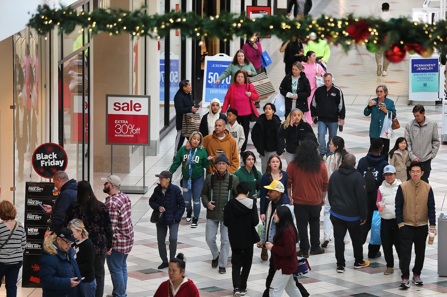 The South Shore Plaza in Braintree was busy on Black Friday as shoppers crowded the mall looking for bargains.