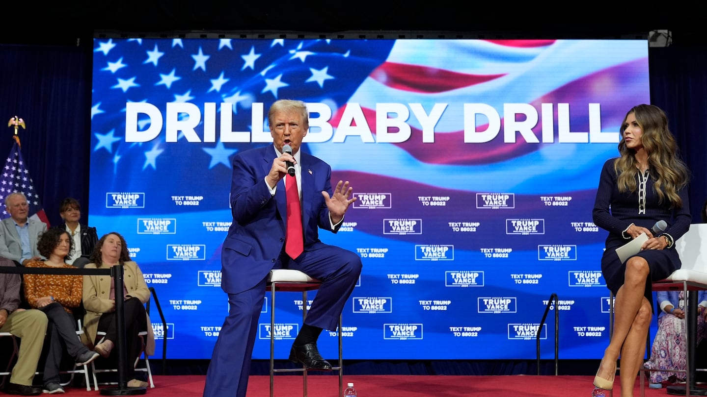 President-elect Donald Trump speaks at a campaign town hall at the Greater Philadelphia Expo Center & Fairgrounds, Oct. 14 in Oaks, Pa., as moderator South Dakota Gov. Kristi Noem listens.