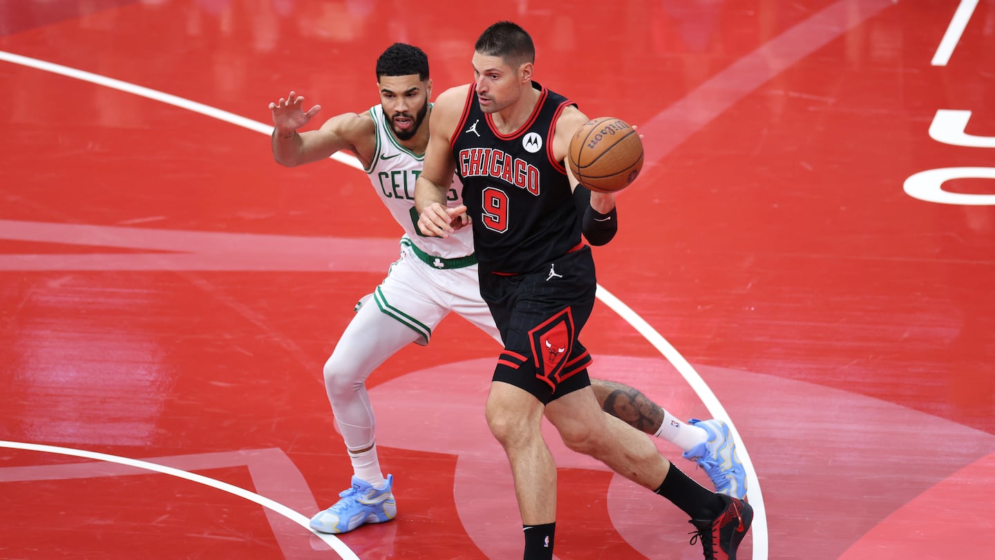 Nikola Vucevic (No. 9) hit 6 of 9 shots from 3-point range to test Jayson Tatum and the Celtics in Friday night's NBA Cup matchup in Chicago.