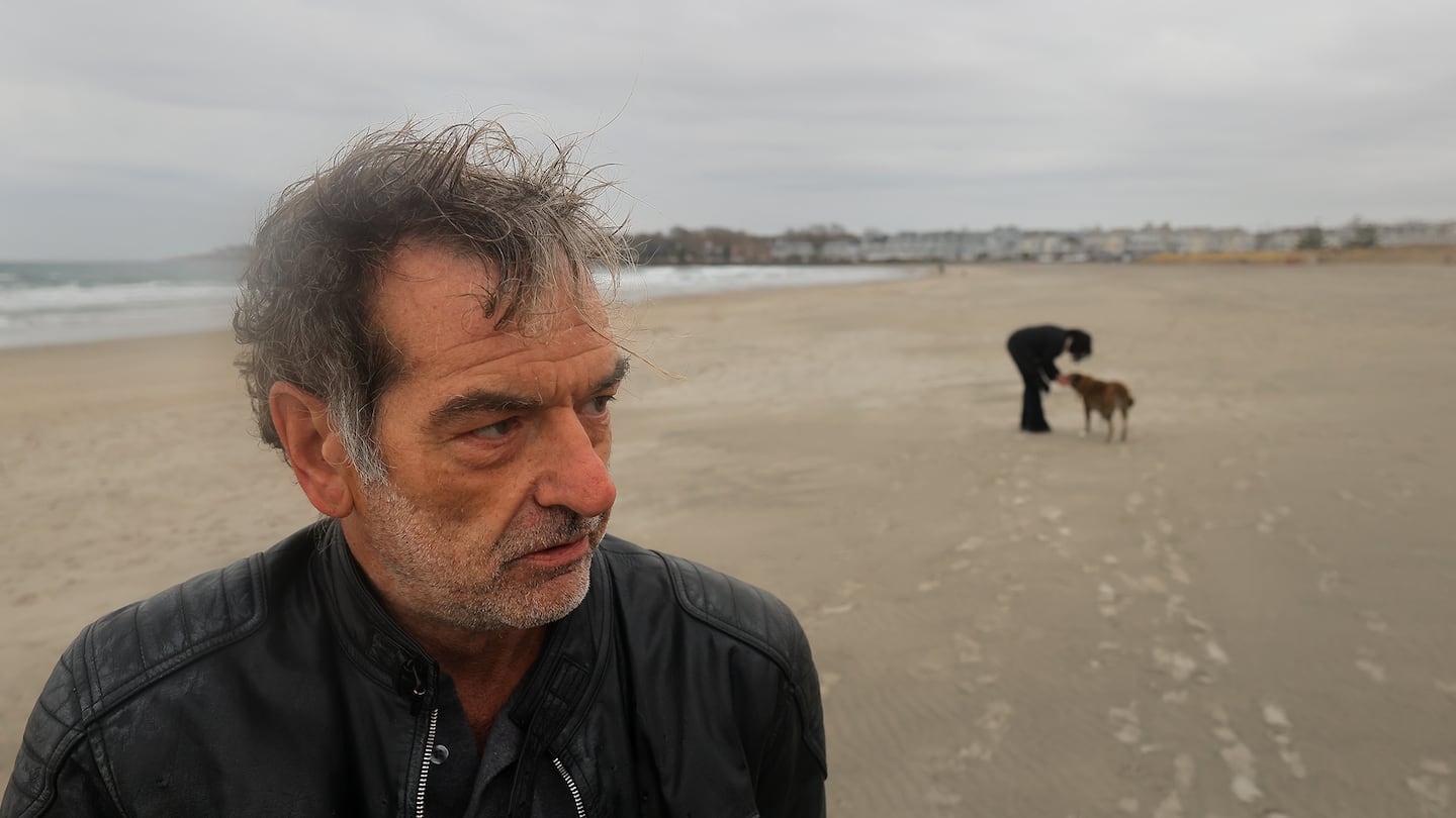 Patrick Fealey joined his girlfriend, Lane McDonald, for a walk on Narragansett Town Beach with his dog, Lily. Fealey, a former Boston Globe correspondent and Narragansett Times art critic, just wrote an in-depth account in Esquire magazine about being homeless in Rhode Island.