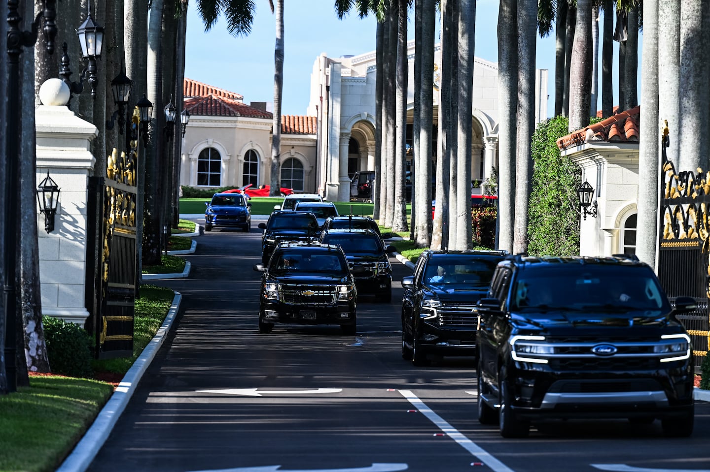 President-elect Donald Trump's motorcade drove out of Trump International Golf Club on its way to his Mar-a-Lago residence in West Palm Beach, Fla., Sunday. Local officials and residents say his presence has brought an onslaught of traffic congestion, road closures, and general disruption to the surrounding area.