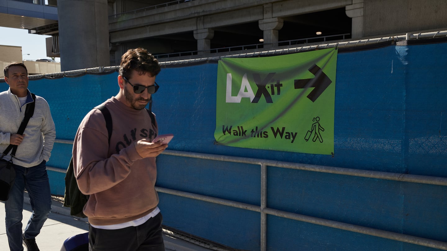 To get take an Uber from Los Angeles International Airport, travelers must rely on LAX-it, which requires a bus or a hefty walk. MUST CREDIT: Sean Scheidt for The Washington Post