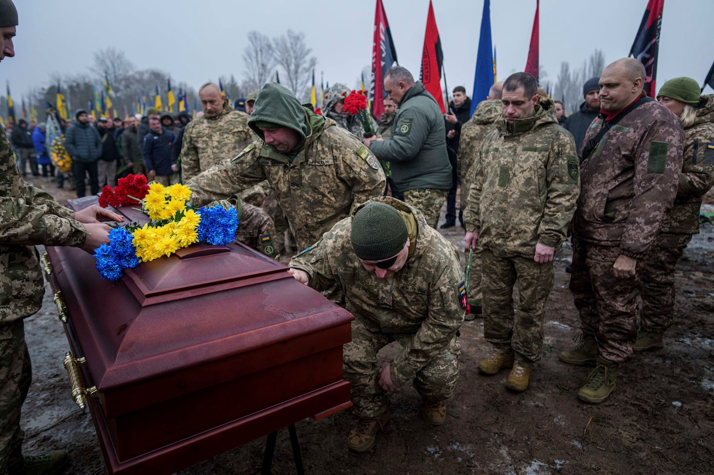 Ukrainian servicemen bid farewell to their comrade Pavlo Vedybida aka "Obolonchik" in a cemetery in Kyiv on Saturday.