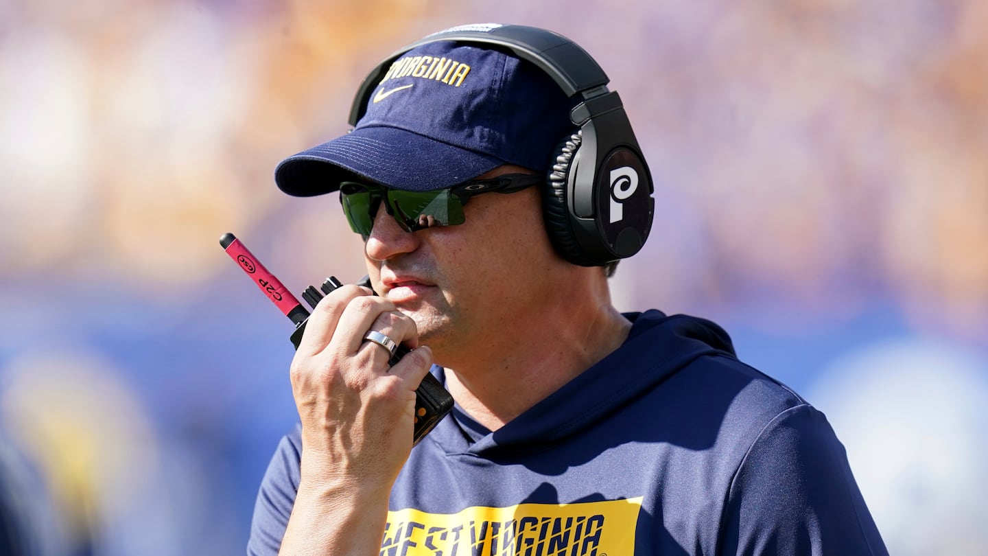 Fired West Virginia football coach Neal Brown spent two years as a wide receiver at UMass and then served as an assistant coach for a year.