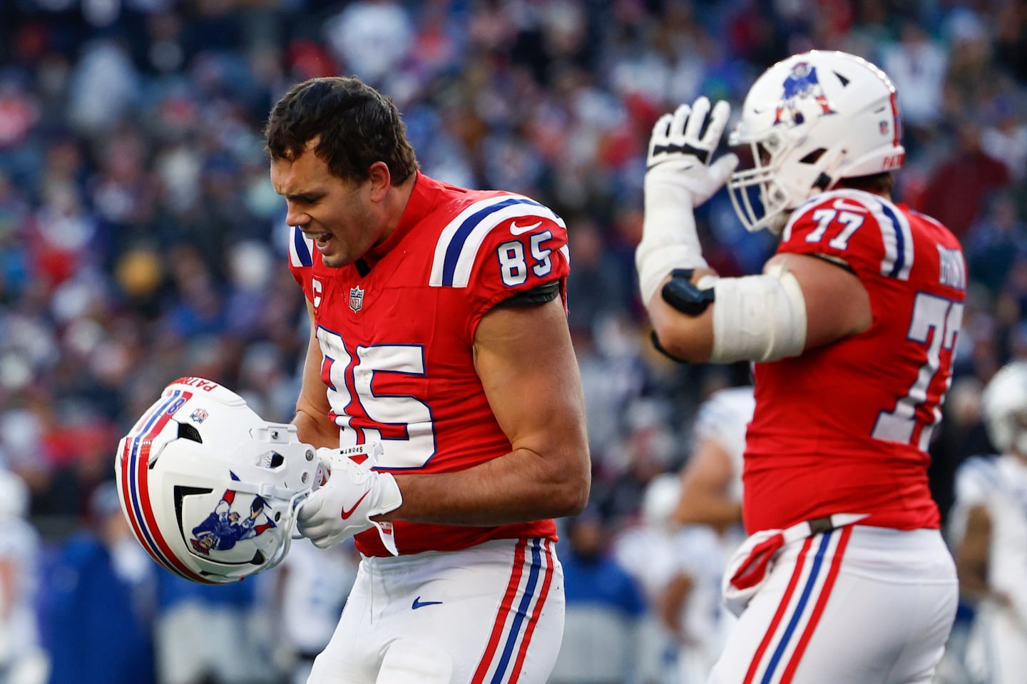 Patriots tight end Hunter Henry reacted with anger after the Colts came up with an interception on a tipped ball.