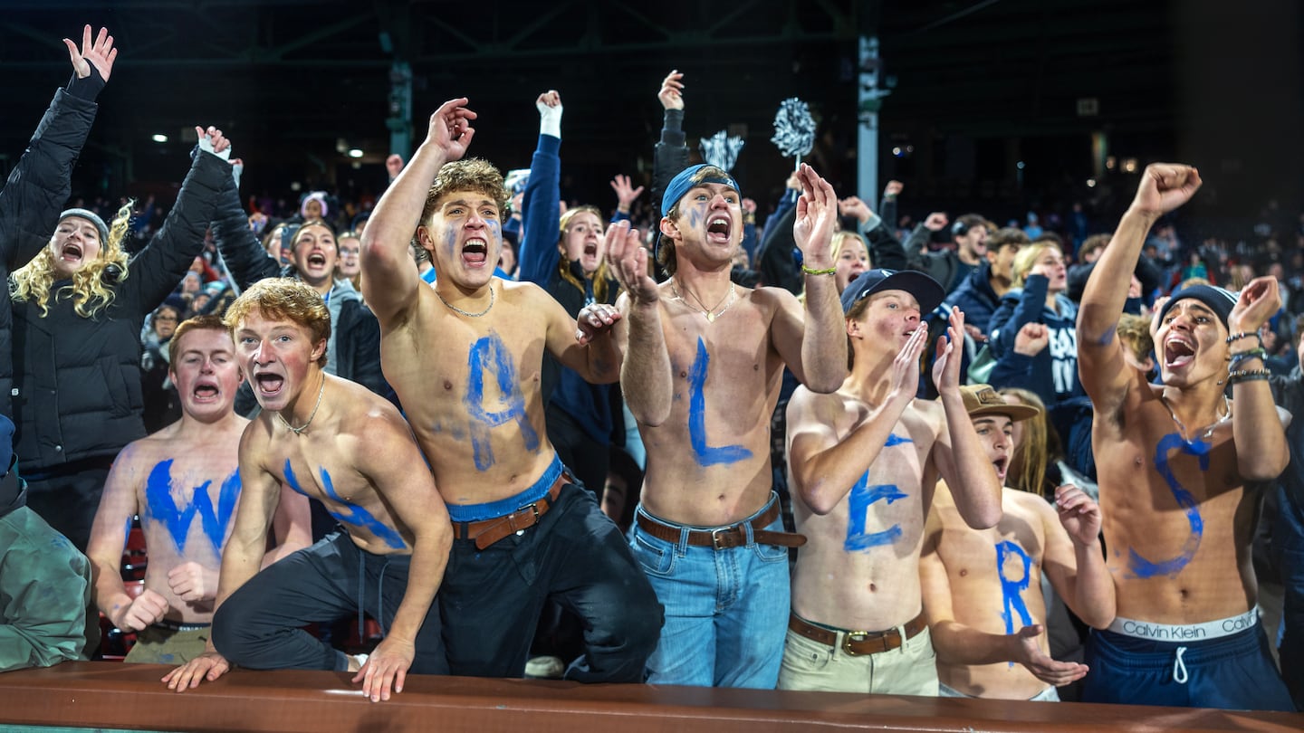 Paxton Fitch, Soren Edwardes, Nolen Mosscrop, Curren Wiggin, Ben Freeman, David Foley, and
Ronald Del Rosario Gomez braved the 45-degree chill at Fenway Park last month to rally the Nantucket Whalers high school football team to victory over Martha's Vineyard.