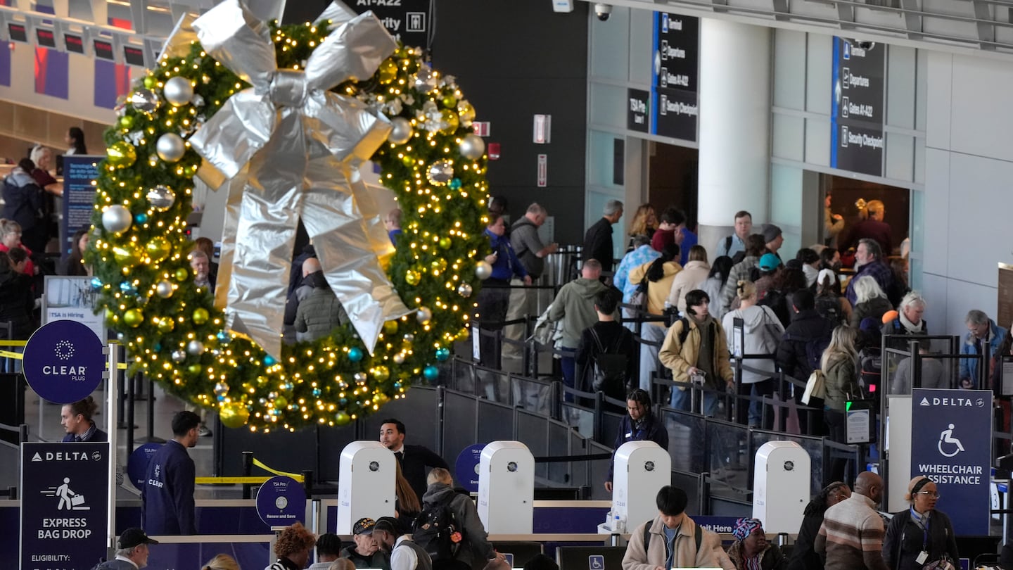 Holiday travelers at Logan Airport.