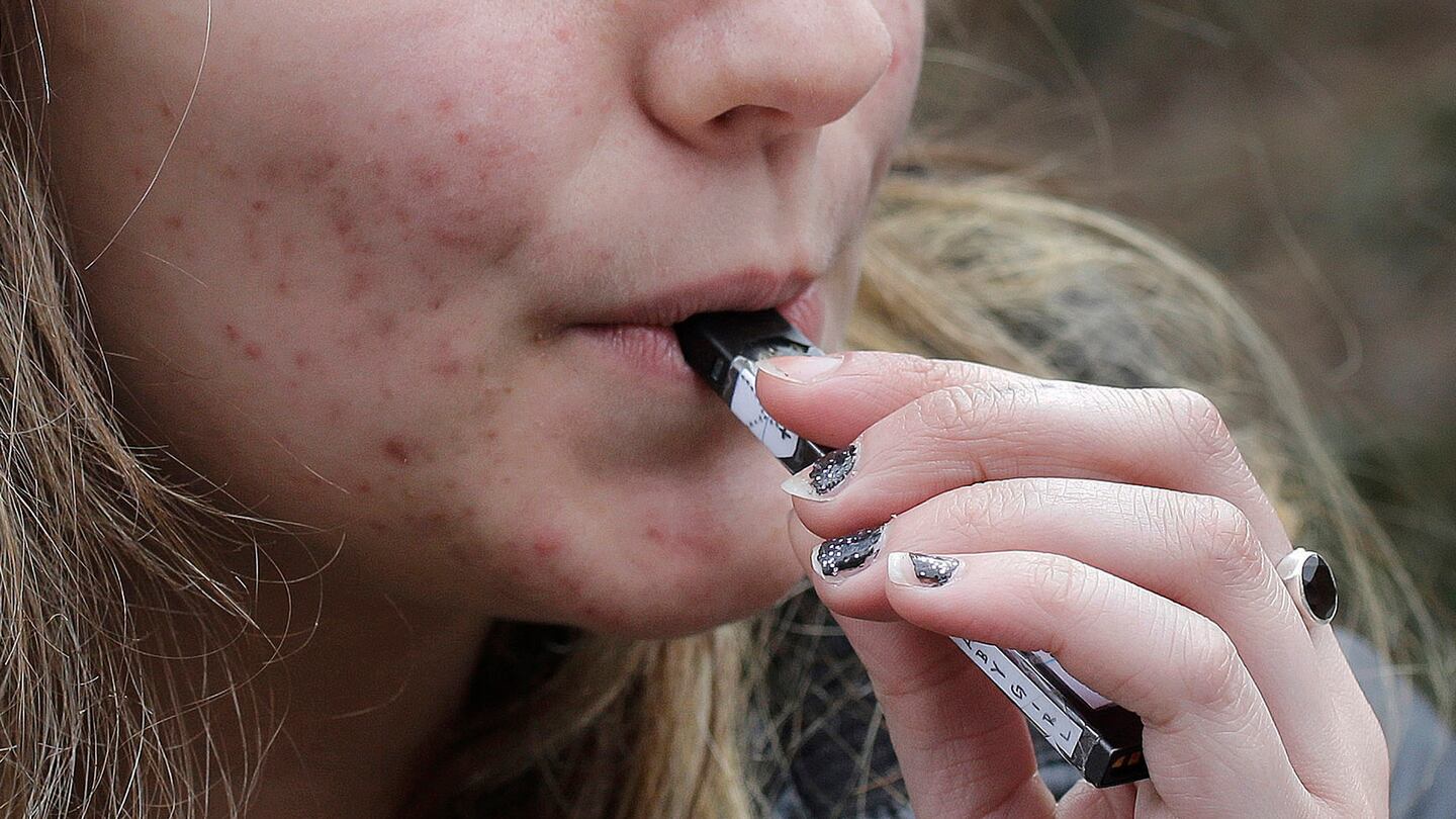 A high school student used a vaping device near a school campus in Cambridge in 2018.