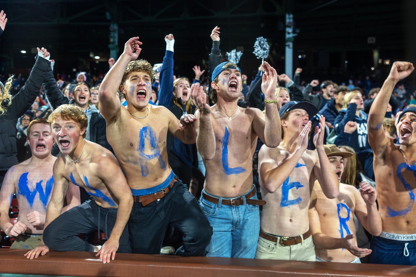 Paxton Fitch, Soren Edwardes, Nolen Mosscrop, Curren Wiggin, Ben Freeman, David Foley, and
Ronald Del Rosario Gomez braved the 45-degree chill at Fenway Park last month to rally the Nantucket Whalers high school football team to victory over Martha's Vineyard.