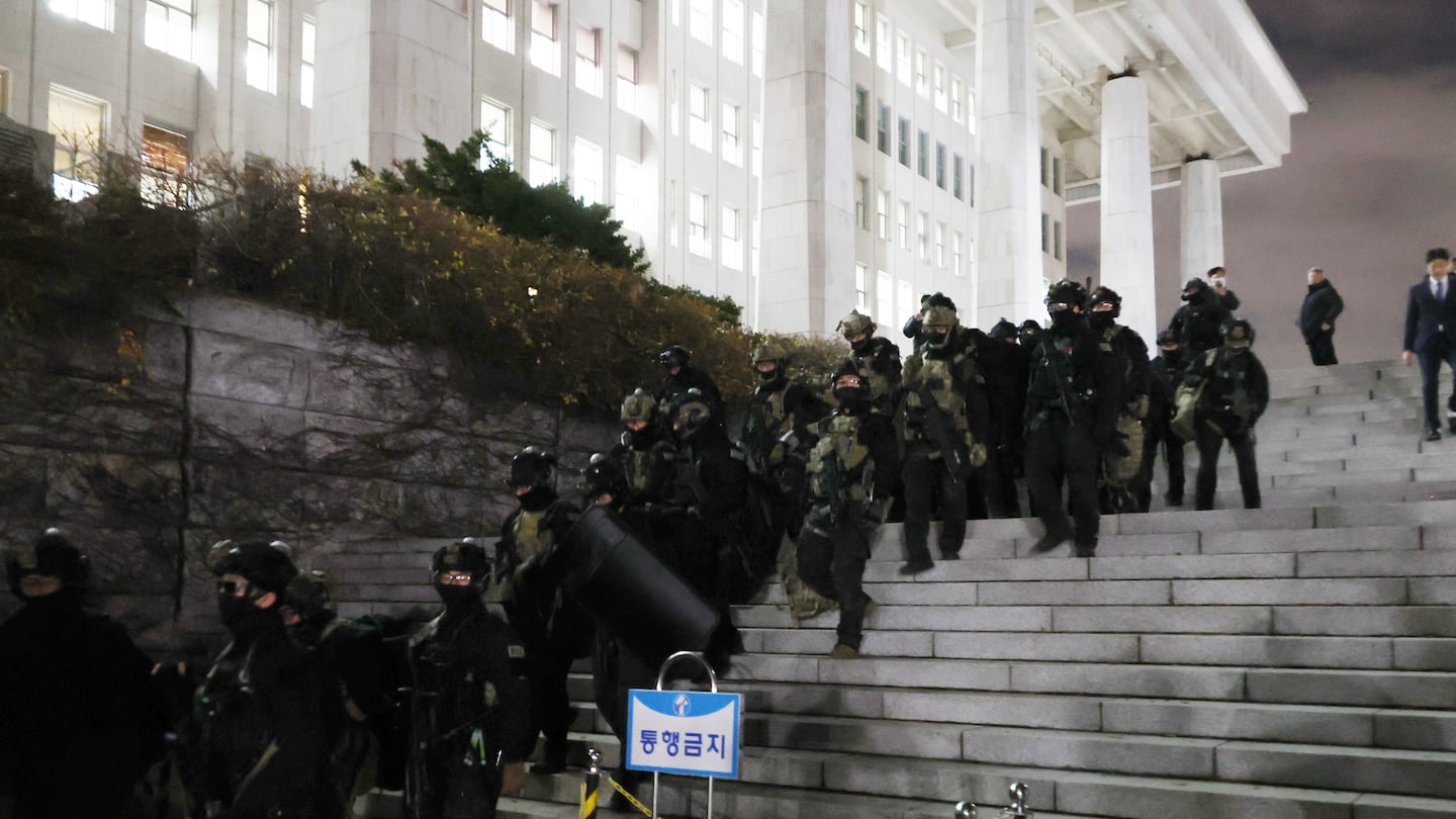 South Korean martial law soldiers leave the National Assembly in Seoul, South Korea, on Dec. 4.