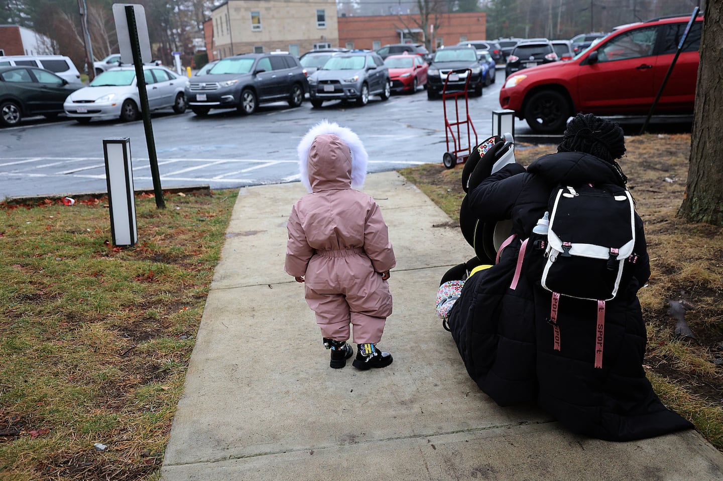 A mother and child prepared to enter a legal clinic in Burlington recently.