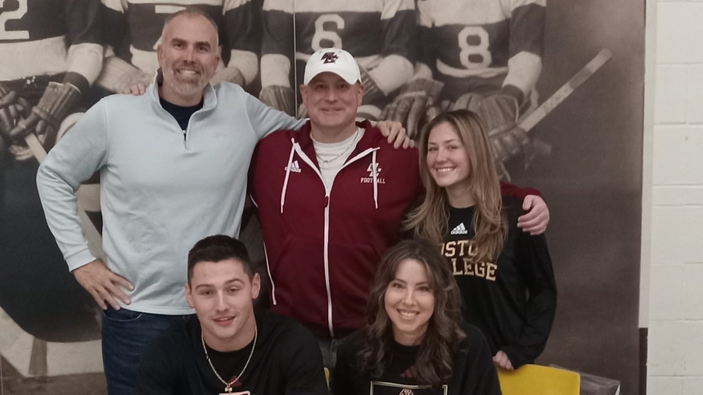 Flanked by (from left) BB&N coach Mike Willey, his parents, Bobby and Wendy, and sister, Alivia, Bo MacCormack signed his national letter of intent to play at Boston College.