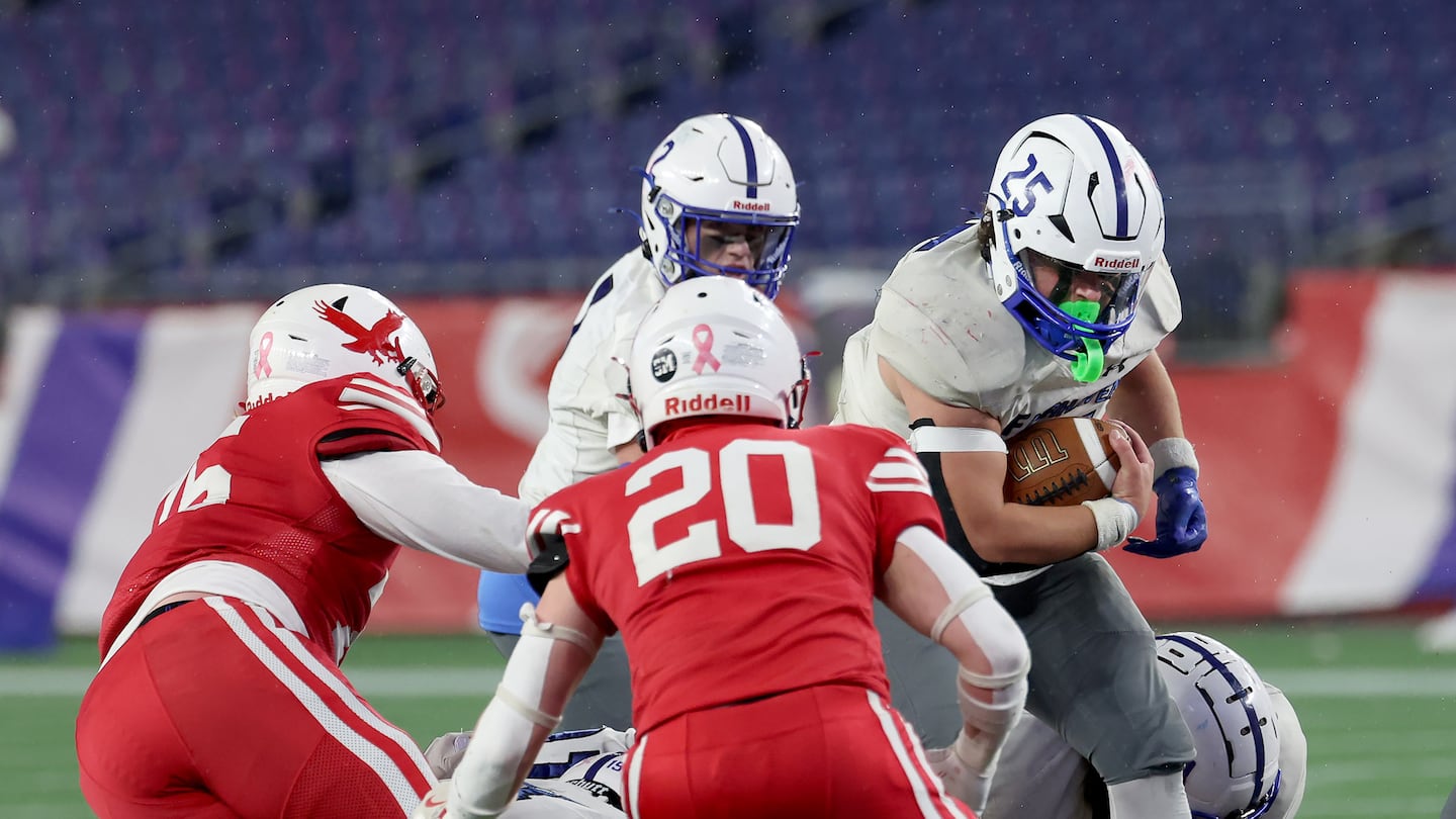 Fairhaven senior back Justin Marques (25) plows ahead for yardage on a first-half carry in the Division 7 Super Bowl. He was sidelined for the second half with an undisclosed injury.