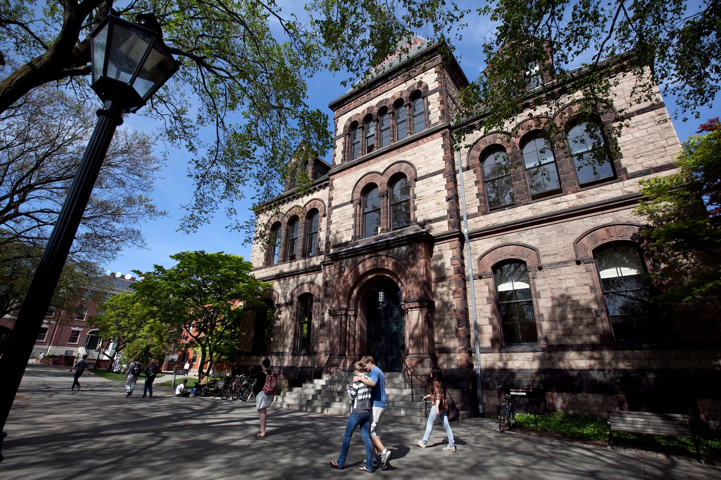 Passers-by walk past Sayles Hall on the campus of Brown University, in Providence in 2012.