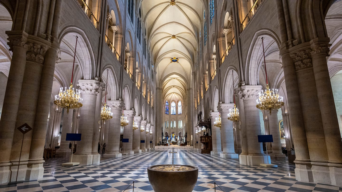 The baptistery designed by French artist and designer Guillaume Bardet is pictured as French President Emmanuel Macron visits the restored interiors of the Notre-Dame de Paris cathedral, Nov. 29, in Paris.