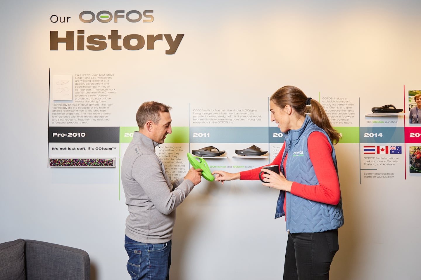 OOFOS employees and “buddies” Sophie Thibault-Vazquez and Pedro Rodrigues at the Braintree headquarters.