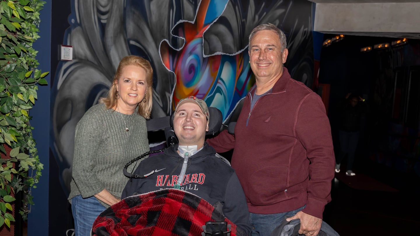 Ben (center) and his parents Sherri (left) and Marty at the 2024 Bowl for Ben event.