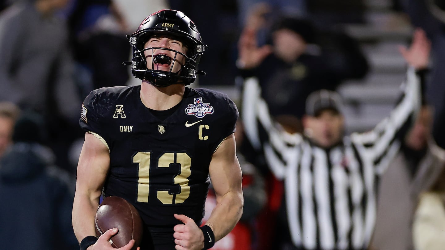 Army quarterback Bryson Daily celebrates scoring the first of four touchdowns to help the Black Knights win the American Athletic Conference championship.