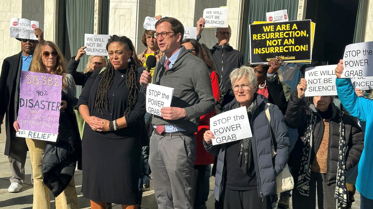 Rev. Rob Stephens with the NC Poor People's Campaign speaks at a news conference outside the North Carolina Legislative Building in Raleigh, N.C. on Dec. 2.